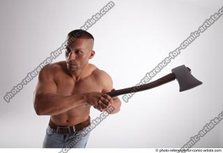 ROGELIO  WITH AX AND GUN